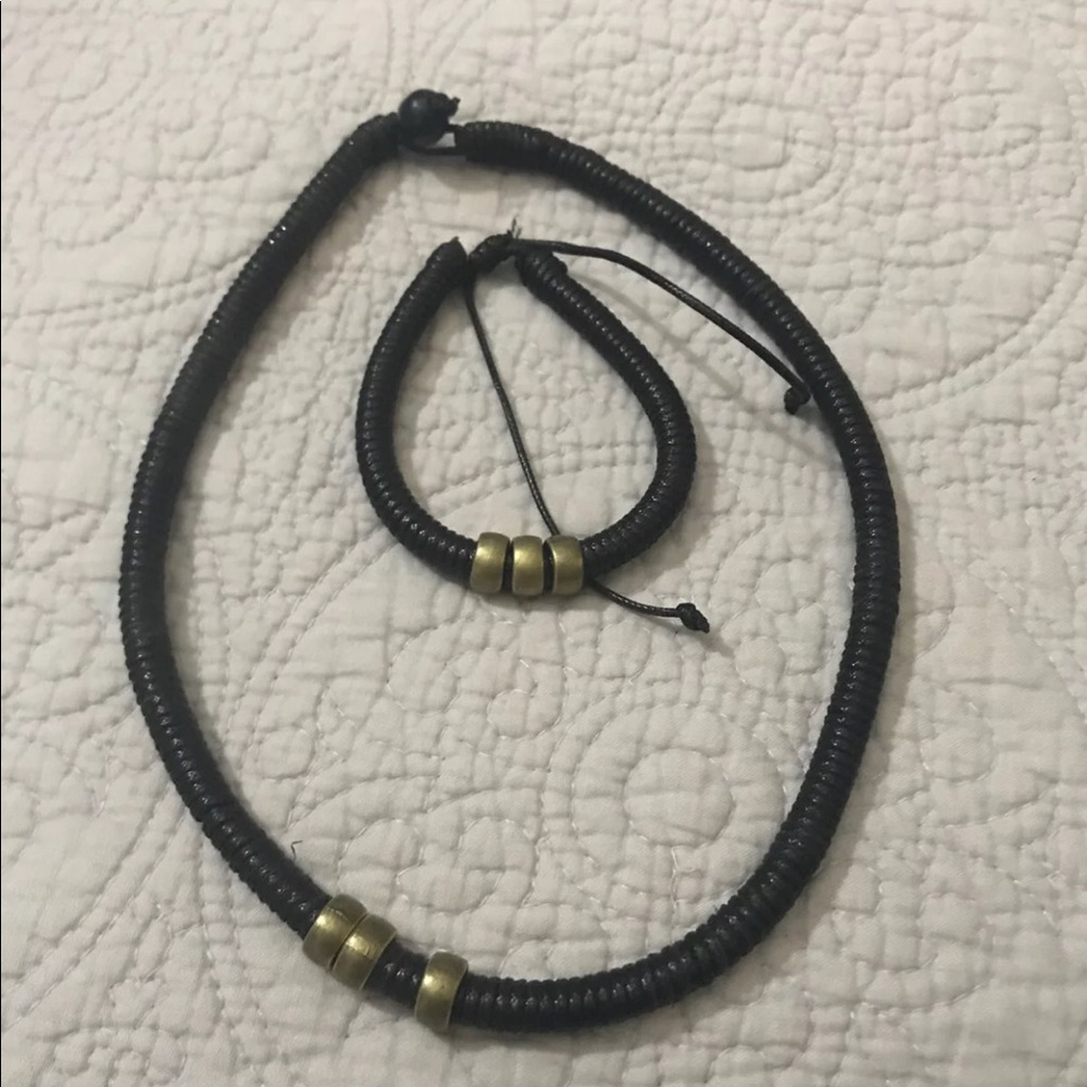 NWOT men’s cow leather rope and brass set